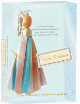 Porte bonheur. 1 livre de citations et un bijoux de sac porte clé