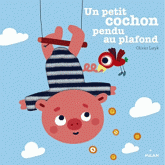 Un petit cochon pendu au plafond